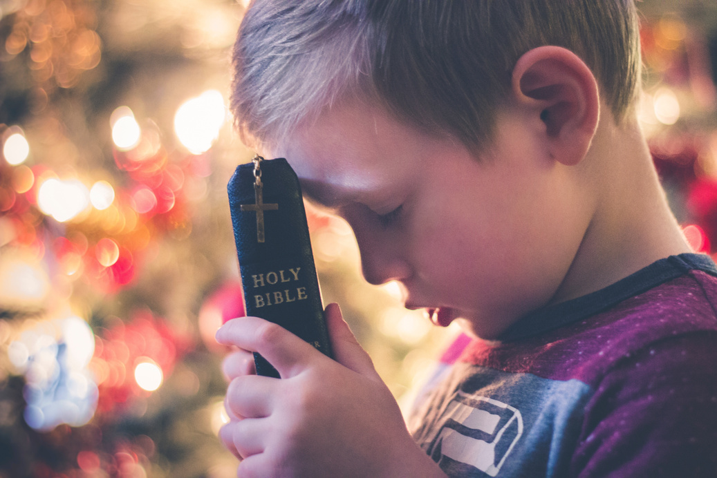 Little Boy Praying on Christmas